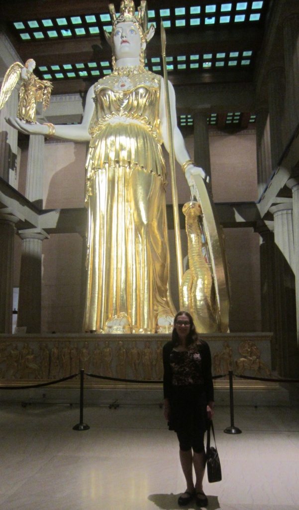 The inner space of the Nashville Parthenon is dominated by the 41' sculpture of the Olympian Goddess, Athena.  Her pose, proportions, gold-plating, weapons, and winged companion, Nike, Goddess of Victory, are based upon historical descriptions.